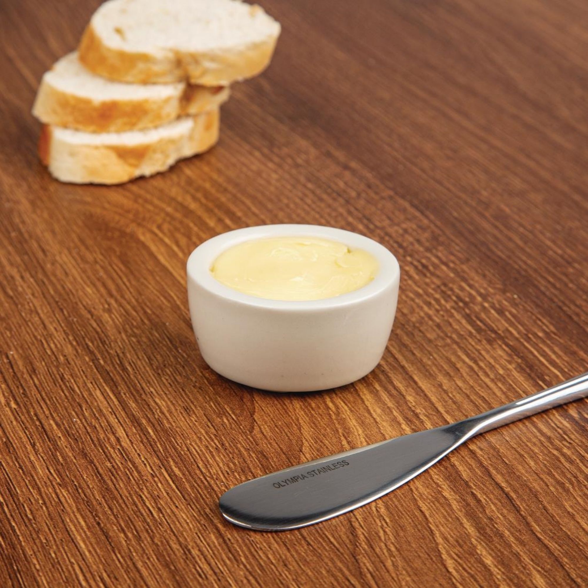 Picture of Olympia Ivory Butter Dish 56mm (Pack of 12)