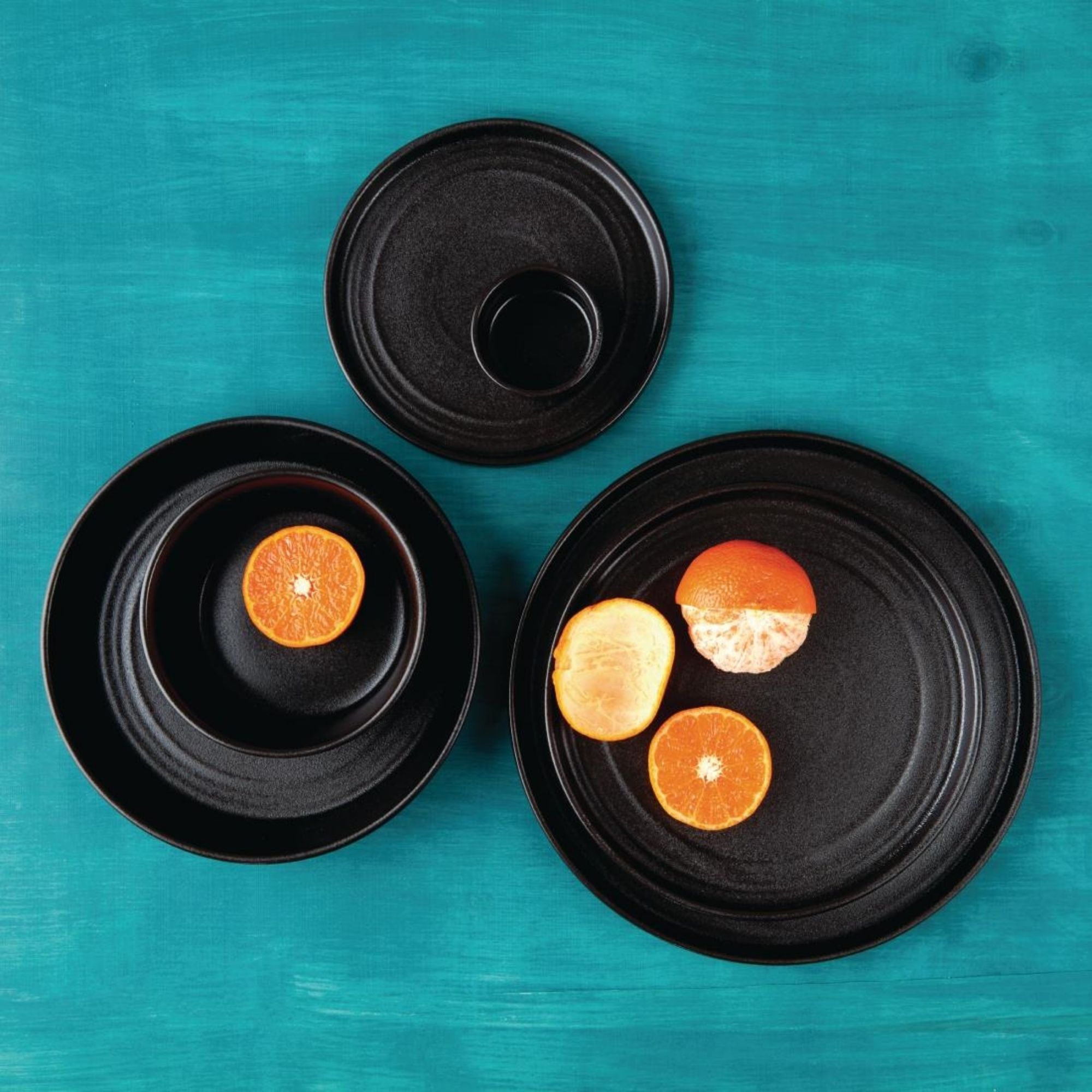 Picture of Olympia Cavolo Flat Round Plates Textured Black 270mm (4 Pack)